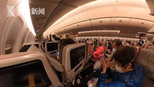 回国路丨40万买机票,看到防疫工作人员时,我哭了