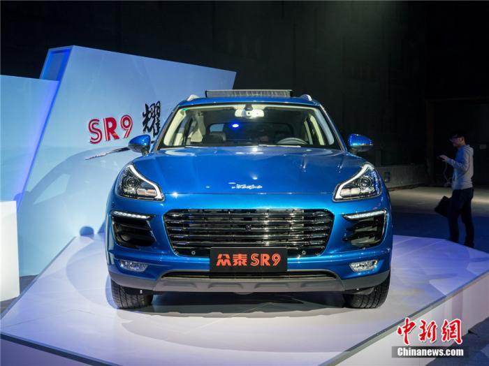 资料图:2016年10月10日,北京,众泰发布了S系列的第二款车SR9中级SUV。郝清 摄 图片来源:视觉中国