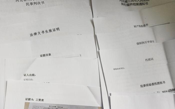 中国政法大学学子担任公民代理人，历时两年为9名工人讨回欠薪