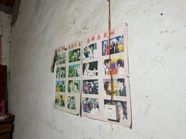 汤某叶出生的老屋里,墙上还张贴着武打电影的海报。