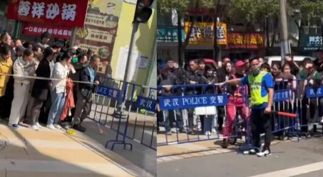 武汉一剧组封路与居民发生争执，交警称“不是我们封的”