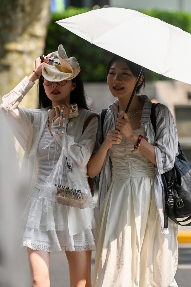 上海明天局部地区有中到大雨，周二起以多云为主