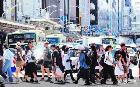 日本多地发布“中暑警报”