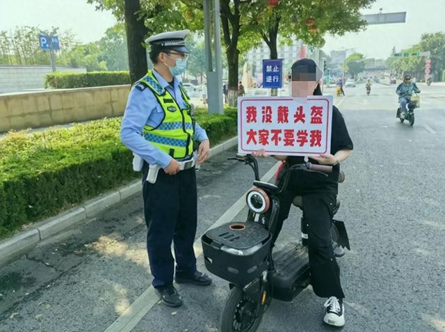 杨凌交警全力推进头盔佩戴整治行动