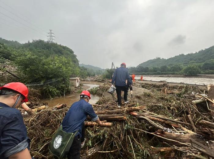 7300平方公里区域拉响红色预警,北京与暴雨鏖战24小时纪实