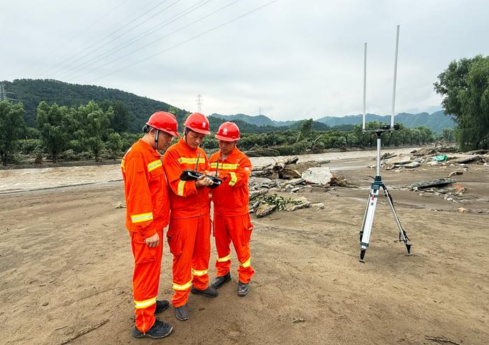 7300平方公里区域拉响红色预警,北京与暴雨鏖战24小时纪实