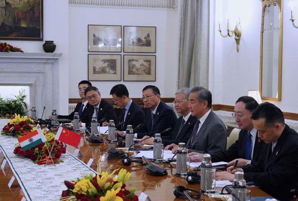 王毅会晤印外长:视对方为伙伴,而不是对手