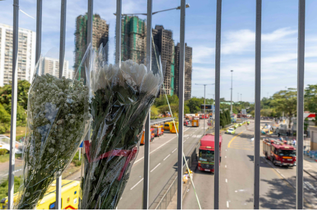 香港大火之下，风暴眼中的竹棚工