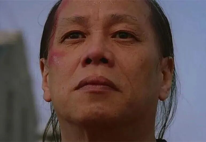 梁小龙在《功夫》中饰演“火云邪神”