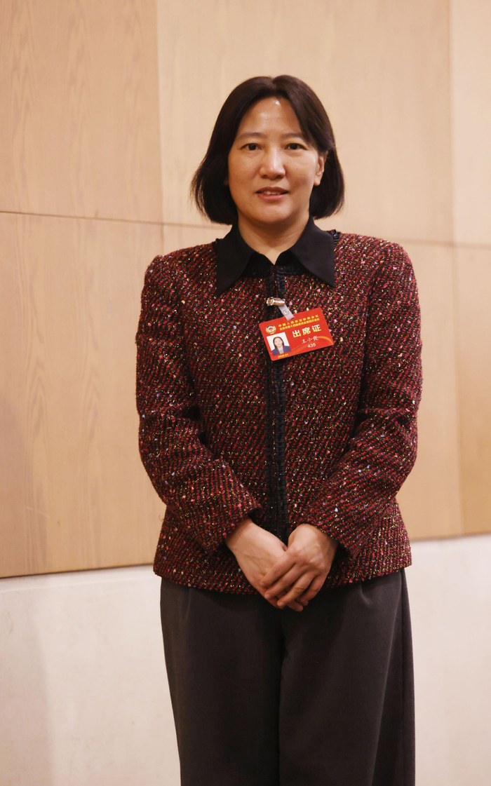 来自农业界别的北京市政协委员、中国农业发展集团财务部总经理王小霞。 新京报记者 李木易 摄