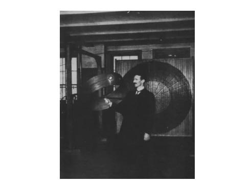 ▲1899 年,特斯拉用远处振荡器发出的电波点燃真空灯泡
