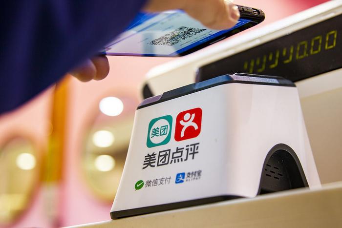 (佣金抽成是美团外卖商业模式的核心 图|视觉中国)