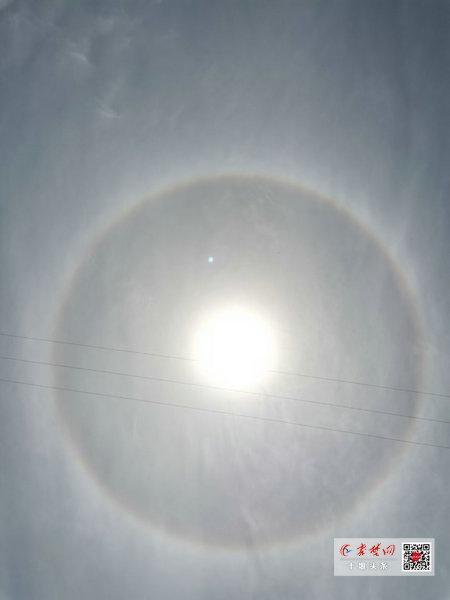 雨后初晴十堰天空现绝美日晕，你看到太阳“彩环”了吗？