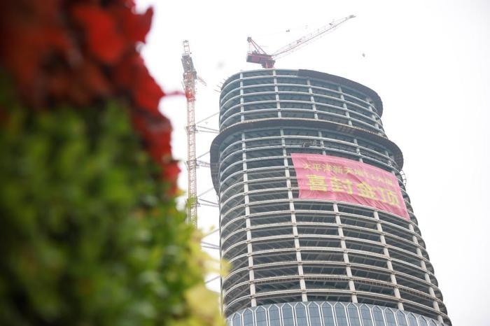 上海市中心又多了一个新地标，250米高太平洋新天地T1大厦封顶