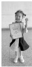 参加体育舞蹈比赛并获一等奖 这个小达人是幼儿园里的小明星