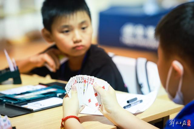 这个杭州亚运会正式比赛项目，吸引上海千名中小学生共掀桥牌风潮