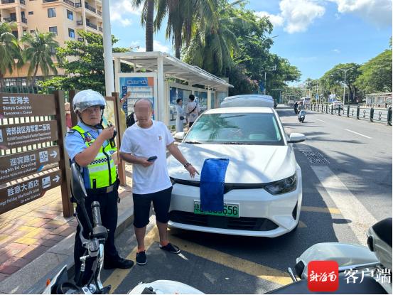 为躲避“电子警察”抓拍 三亚一男子用抹布遮挡车牌被处罚