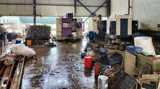 洪水围困下的涿州机加工企业：设备抢修与复工复产