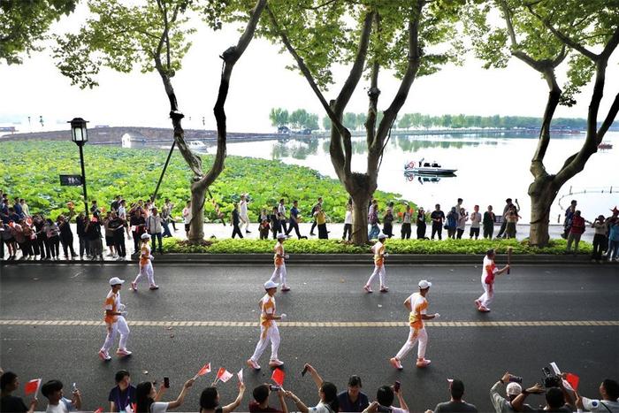 太燃啦！杭州亚运会火炬传递首日 现场精彩图集来袭（组图）