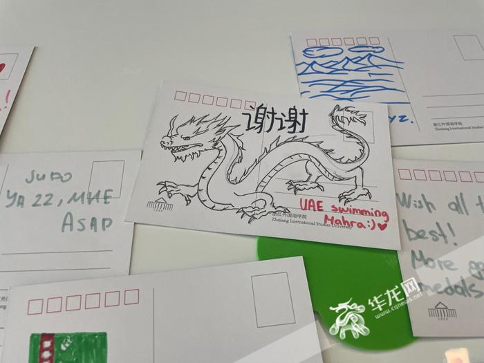 “渝”见亚运 | 外国运动员体验中国传统文化 20米长的留言簿上写下满满的“友谊”