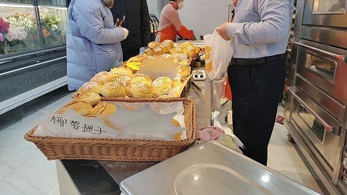 ▲ 北京首家2元面包店。图 / 每日人物摄
