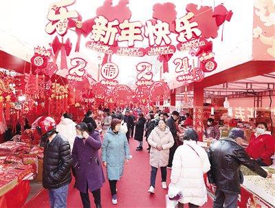 古城西安年味渐浓 年货节上已是人流如织