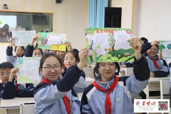 茅箭区茅箭小学师生“为泗河添新绿”