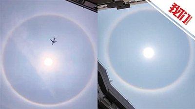 深圳天空出现日晕景观 一架飞机横穿日晕现场被拍下