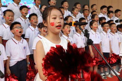 郧阳思源实验学校举行“强国复兴有我”唱红歌比赛