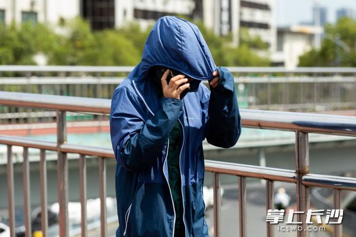 组图丨“伏”摇直上40℃，出行请做好防护