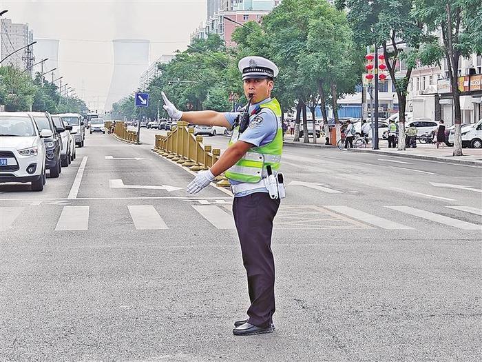 “文明交通示范岗”让文明出行成风尚