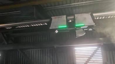 ▲杭州国巡机器人科技有限公司研发的巡检机器人在火力发电厂输料廊道的工作场景。