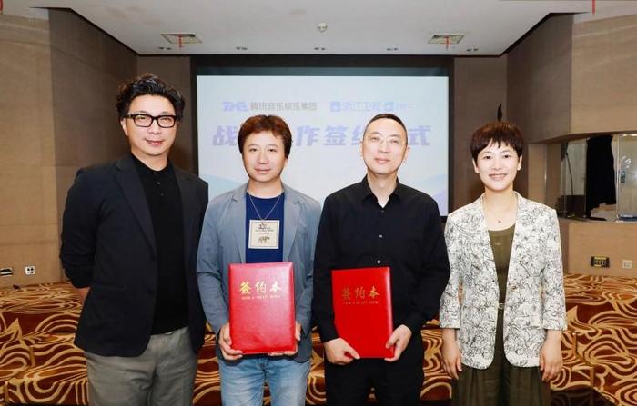 左一左二:腾讯音乐娱乐集团内容合作部副总裁曾志中、内容合作部高级总监郭修非