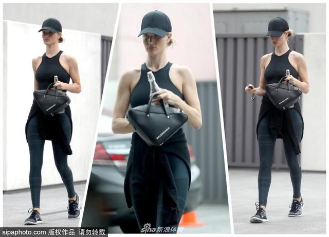 2018年6月1日消息,美国洛杉矶,罗茜·汉丁顿-惠特莉(Rosie Huntington-Whiteley)黑色运动装前往健身房运动,好身材一览无遗。