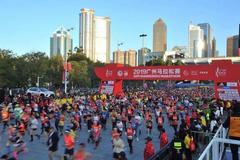广州马拉松赛会纪录告破 董国建彭建华双双跑进210