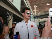 中国游泳队载誉而归孙杨受追捧