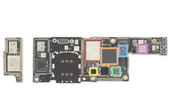 ▲iPhone XS 主板,橙色部分为基带芯片。 图片来自:iFixit