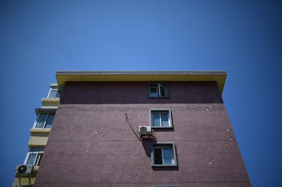 腾龙SP 35mm F1.4 Di USD镜头在f/1.4光圈下有较为明显的暗角