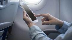 人民日报谈飞机上用手机：打破空中信息孤岛