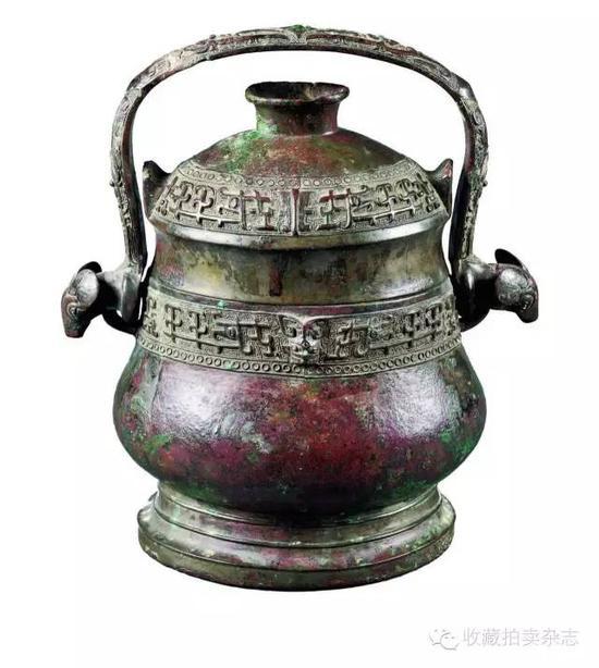 青铜提梁铜卣,南京博物院藏, 西周时期, 口纵10.6cm, 口横14.5cm, 底纵13.7cm, 底横17cm, 通高28.2cm