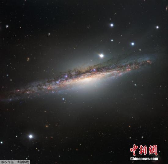 资料图:鲸鱼座NGC1055星系
