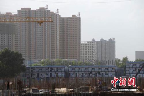 资料图:正在建设施工中的工地。