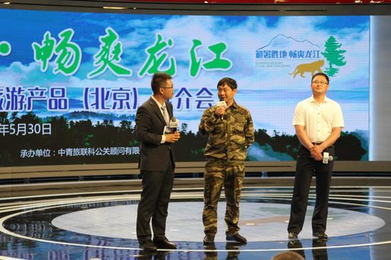 来着黑龙江小兴安岭的护林员和伊春的丹顶鹤饲养员推介黑龙江生态旅游资源