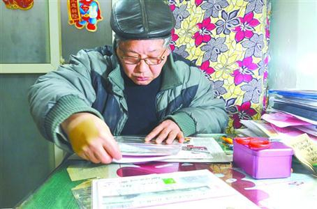 &nbsp;&nbsp;图片说明：每天，老王都会花几个小时的时间整理收藏