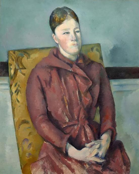 《黄色座椅上的塞尚夫人》（Madame Cézanne in a Yellow Chair，1888-1890）