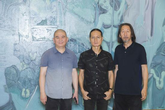 冀少峰（左一）、邓箭今（中）、艺术家王广义