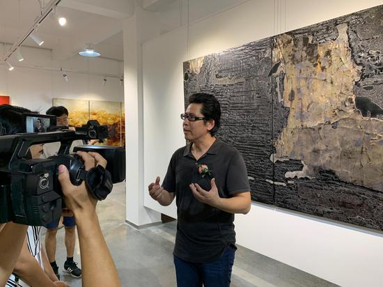 中国美术家协会理事、漆画艺术委员会副主任兼秘书长、福建省美术家协会副主席汤志义先生接受采访