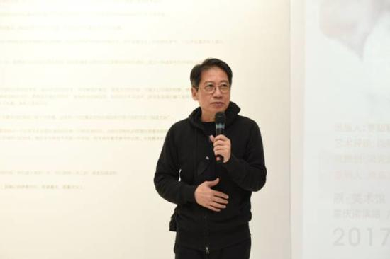 国际摄影策展人尚陆