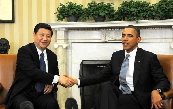 国家主席习近平今年9月将访美。图为2012年2月习近平和奥巴马在白宫。