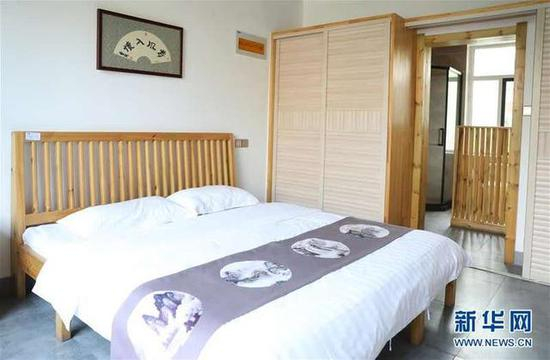 这是盘锦市大洼区荣兴村稻作人家民俗村里的民宿内部（7月16日摄）。新华社记者 姚剑锋 摄